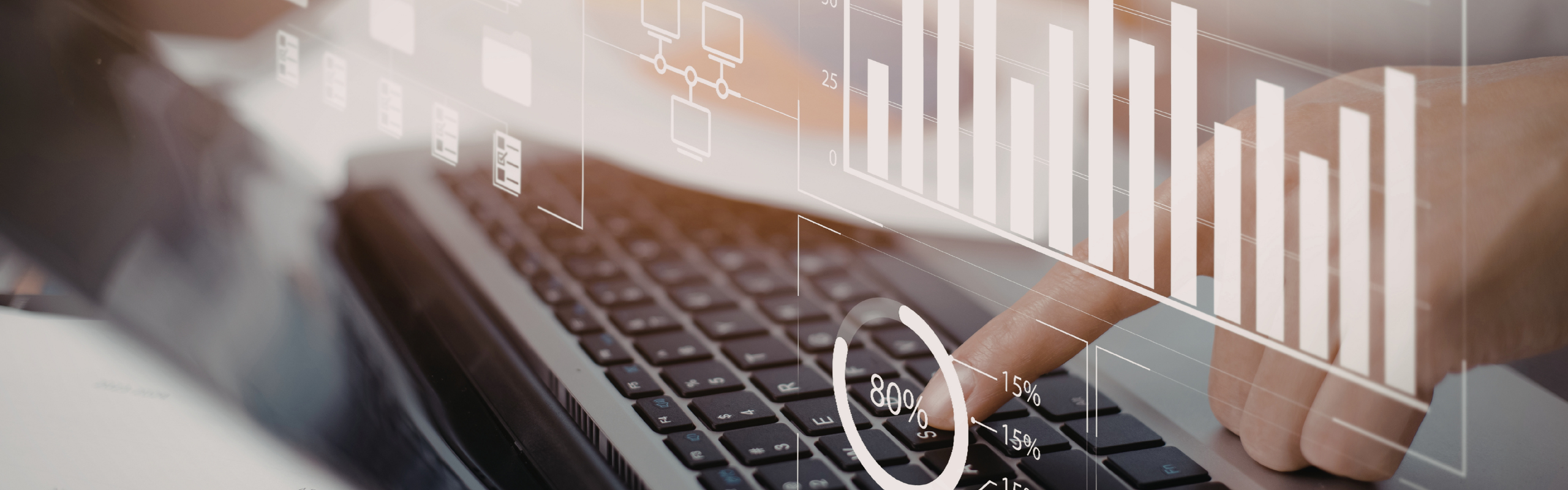 Analyzing data on laptop with graphs and charts