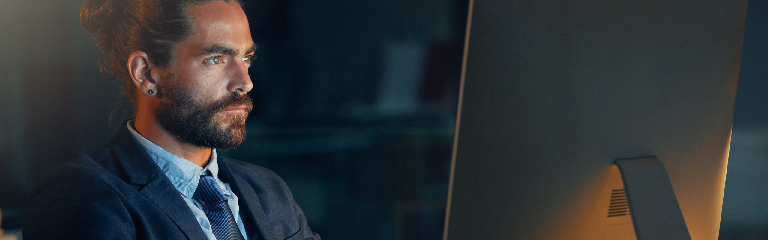 Man looking at a computer