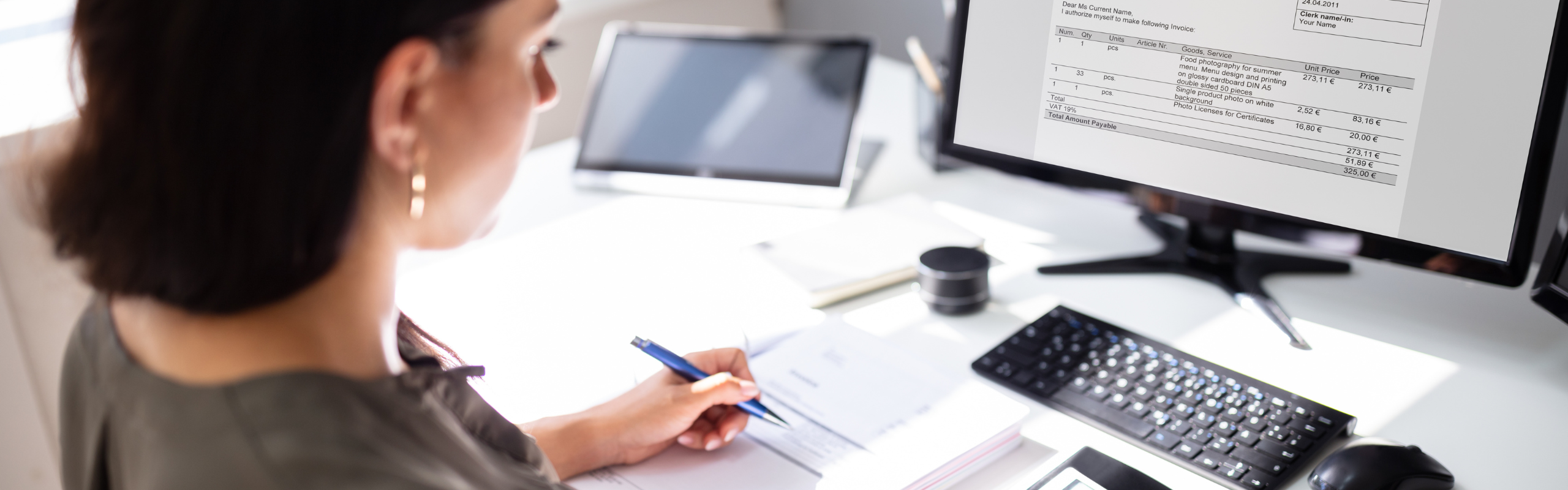 Accountant calculating tax at desk