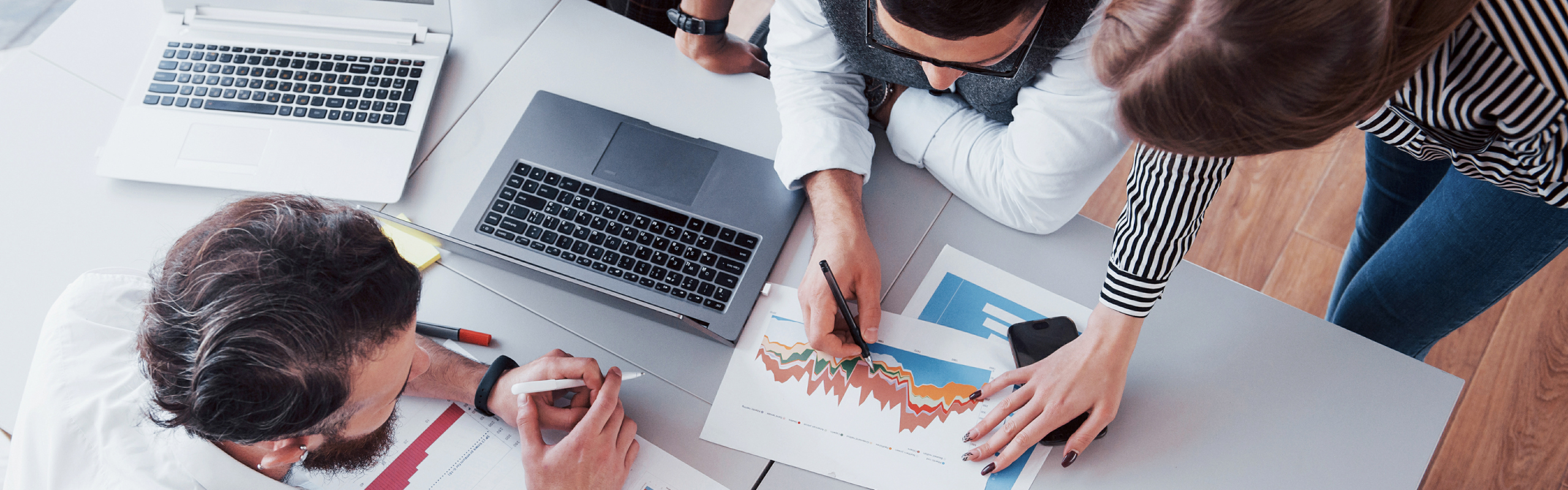 Team Collaboration Over Business Charts