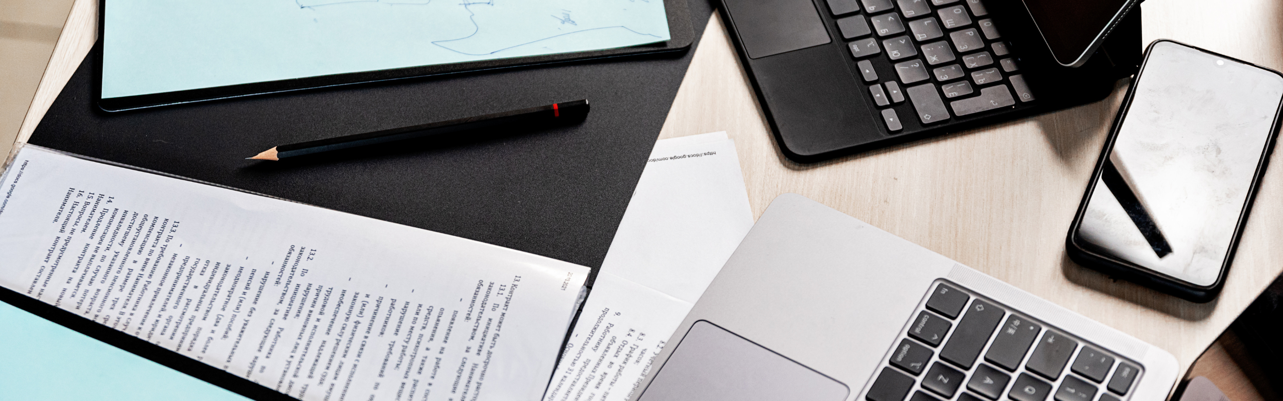 Close-up of a Workspace with Electronic Devices