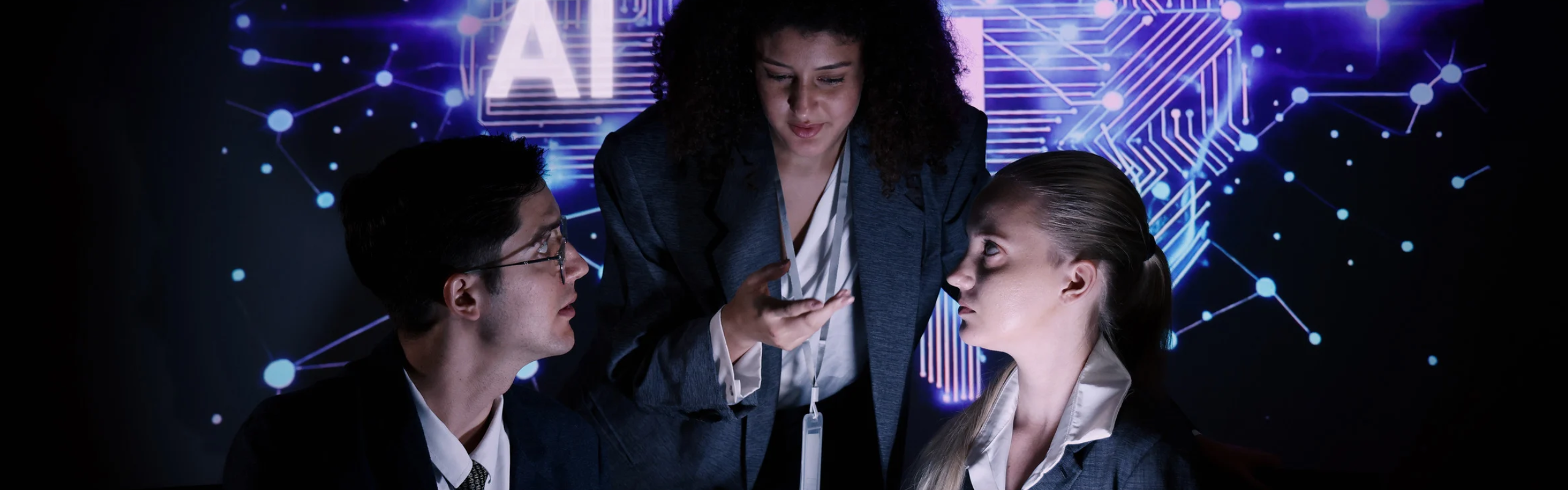 Business team collaborating with futuristic AI workspace illumin